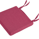 Ein quadratisches, dickes, rosafarbenes KraftKids Sitzkissen für Stühle Leinen mit zwei Paar Stoffbändern auf einer Seite - ideal zum Befestigen an Stühlen als Sitzkissen Kinderstuhl oder für zusätzlichen Komfort im Alltag.