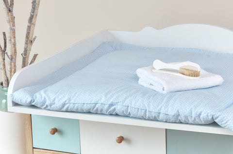 Matelas à langer petites feuilles bleu clair sur blanc