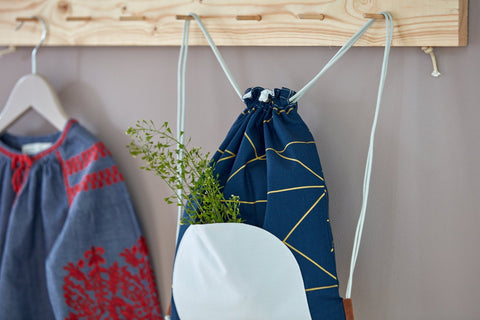 Sac de sport lignes dorées sur bleu foncé