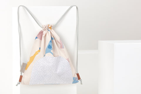 Sac de sport dinosaure de Zoe sur beige